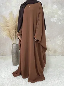 Detail view of the stylish loose batwing sleeve solid color maxi dress for women.
