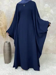 Detail view of the casual solid navy blue batwing sleeve maxi dress and matching hijab.