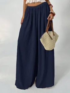 Detailed view of women pleated high waist wide leg pants casual trousers elegant drape