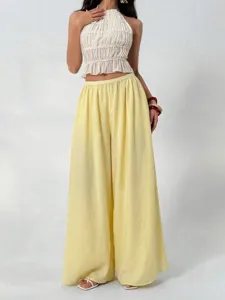 Casual pleated wide-leg trousers for women, high waist elastic design, comfortable drape.