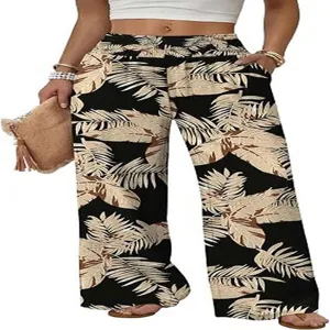 Detailed view of high-waisted wide-leg trousers featuring a stylish tropical palm leaf print.
