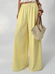 Comfortable high waist wide leg pants with elegant drape and elastic waistband for daily wear.