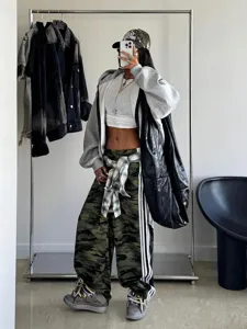 Women casual camo track pants with contrast side stripes, high waist streetwear trousers.
