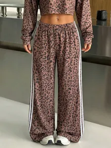 Women leopard print crop top and wide leg sweatpants with white side stripes for autumn.