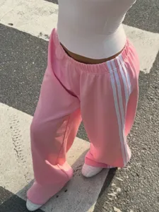 Pink wide leg sweatpants with white side stripes casual streetwear loose active trousers.