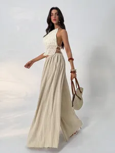 Chic French pleated halter top and high waist wide leg pants set for women, elegant style.