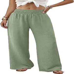High waist wide leg pants detail showing comfortable smocked waistband and loose fit design.