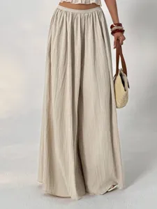 Beige pleated wide leg pants for women, high waist elastic casual trousers with smooth drape.