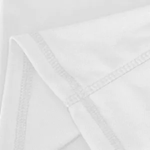Close-up detail of white yoga pants fabric, showing fine stitching and soft micro-elastic texture.