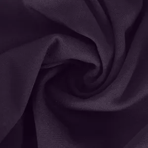 Deep purple athletic fabric detail shot showcasing soft stretch texture and fine knit weave.