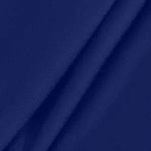 Close-up detail of smooth and stretchy dark blue fabric for yoga pants and activewear.