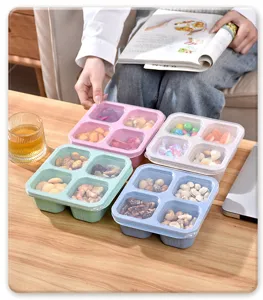 Snackbox met 4 vakken van tarwestro en transparant deksel voor noten en gedroogd fruit.