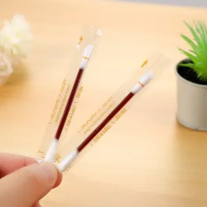 Detail view of disposable iodophor cotton swabs in individual transparent packaging for clean wound care.