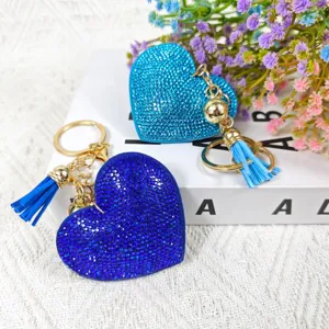 Porte-clés cœur en strass brillant pendentif sac avec pompon et accessoires en métal doré