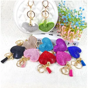 Porte-clés cœur en strass coloré avec pompon, charm de sac mignon et accessoire.