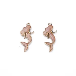Detailed view of gold-plated mermaid alloy pendant charm for DIY jewelry making earrings.