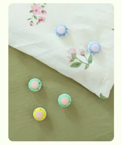 Flocked flower duvet cover pins set, anti-slip soft silicone quilt fixers for bedding.