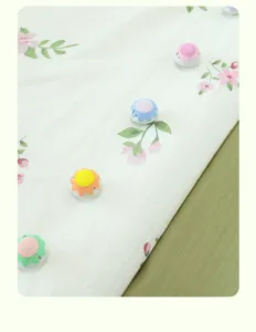 Soft flocked flower quilt holder pin, anti-slip comforter gripper for bedding cover details.