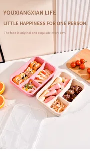 Boîte bento en paille de blé vue détaillée avec trois compartiments et couvercle transparent