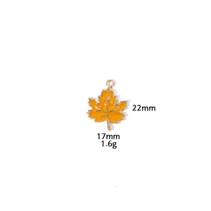 Geëmailleerd esdoornblad hanger DIY sieraden bedel legering goudkleurig 22x17mm accessoire