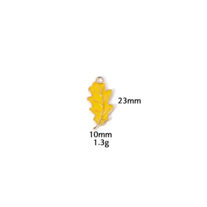 Gele geëmailleerde eikenblad hanger bedel DIY sieraden accessoire maat 23x10mm.