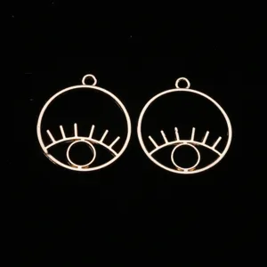 Colgantes de ojo de metal dorado, ideales para la fabricación de joyas DIY y llaveros.