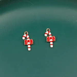 Christmas candy cane alloy charms with red bows, perfect for DIY jewelry bracelets and keychains.