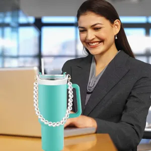 Stanley style teal tumbler with elegant pearl chain strap, portable large capacity insulated cup.