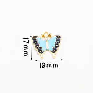 Pendentif papillon en alliage émaillé bleu accessoire bijoux DIY pour collier et bracelet.