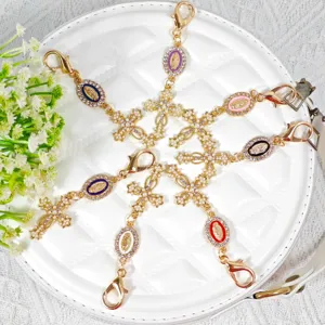 Alloy rhinestone cross rosary keychain and bag pendant set with colorful religious oval charms.