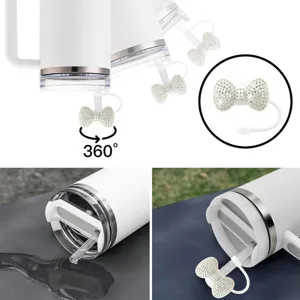 Sparkling rhinestone bow straw cover and dust plug detail, reusable silicone straw topper.