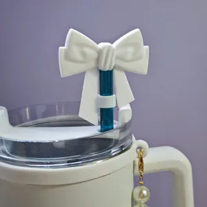Silicone straw cover with white bow and blue glitter, dust proof plug for 10mm tumbler straws.