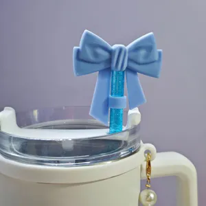 Cute blue bow silicone straw cover for 10mm tumblers, dust-proof topper accessories.