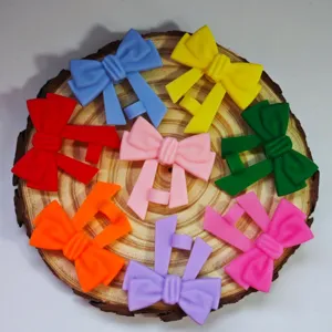 Silicone straw topper detail showing colorful bow design for 10mm tumblers and cups.
