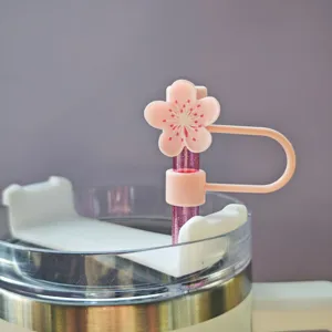 Pink cherry blossom silicone straw cover, cute floral dust cap for 10mm tumbler straws.
