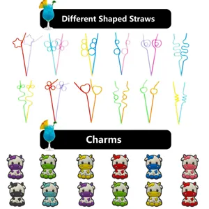 Vue detaillee de pailles aux formes diverses et de charms de vaches mignons pour deco de fete.