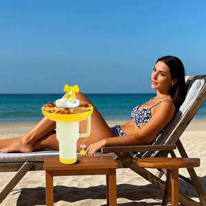 Stanley 40oz tumbler snack tray with bow straw cover and cute pendant for beach travel.