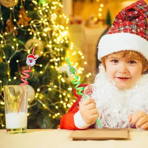 Detailed view of Christmas curly straws featuring a Santa and tree decor for holiday parties.
