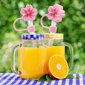 Silicone flower straw cover with mason jar set, dustproof drink accessory detail view.