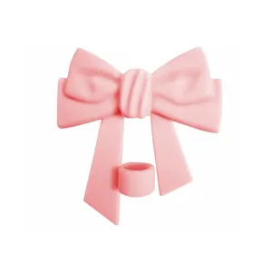 Pink bow silicone straw cover for 10mm reusable straws, cute dustproof cup accessory.