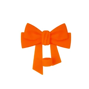 Close-up detail of vibrant orange silicone bow straw cover featuring a 10mm ring design.
