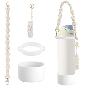 Handmade macrame water bottle strap set with silicone boot pouch and accessories for cups.