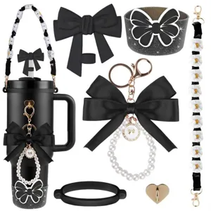 Details of black tumbler accessories set with cute bows, pearl keychain and daisy strap.