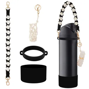 Handmade black white woven water bottle strap set with silicone boot and lipstick pouch.