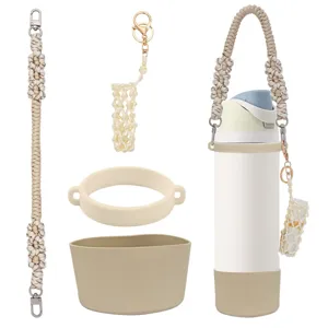 Handmade macrame water bottle strap set with silicone boot and mini lipstick pouch.