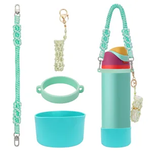 Handmade braided water bottle strap set with silicone boot, cup ring, and lipstick pouch accessories.
