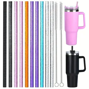 Set of colorful glitter straws, cleaning brushes, and travel tumbler mugs with handle.