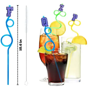 Detail view of colorful decorative letter plastic drinking straws with a long cleaning brush.