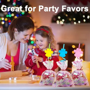 Detail shot of cute cartoon dog paw spiral straws in party favor bags during family event.