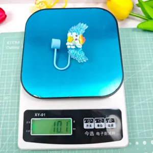 Creative acrylic wings straw dust cap with cute cartoon pony design for daily drink cups.
